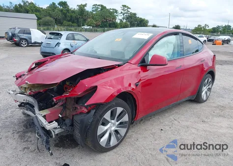 2023 Tesla Model Y Awd/Long Range Dual Motor All-Wheel Drive z USA, uszkodzony, nr VIN 7SAYGAEE6PF777290